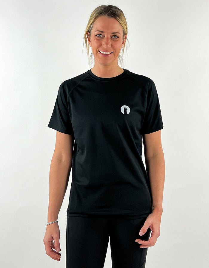 Woman wearing a black active llama T-shirt, breathable and quick-drying workout top
