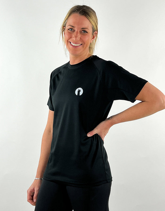 Black Active Llama breathable and quick-drying black workout t-shirt worn by smiling woman