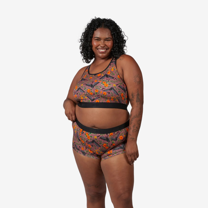 Model: Maliyah is 5'7" and wears a 2X