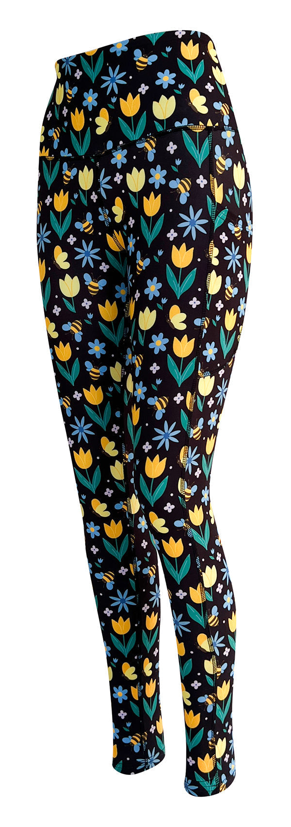 Black leggings with vibrant yellow tulips, blue forget-me-nots, white daisies, and bumblebee patterns with pockets