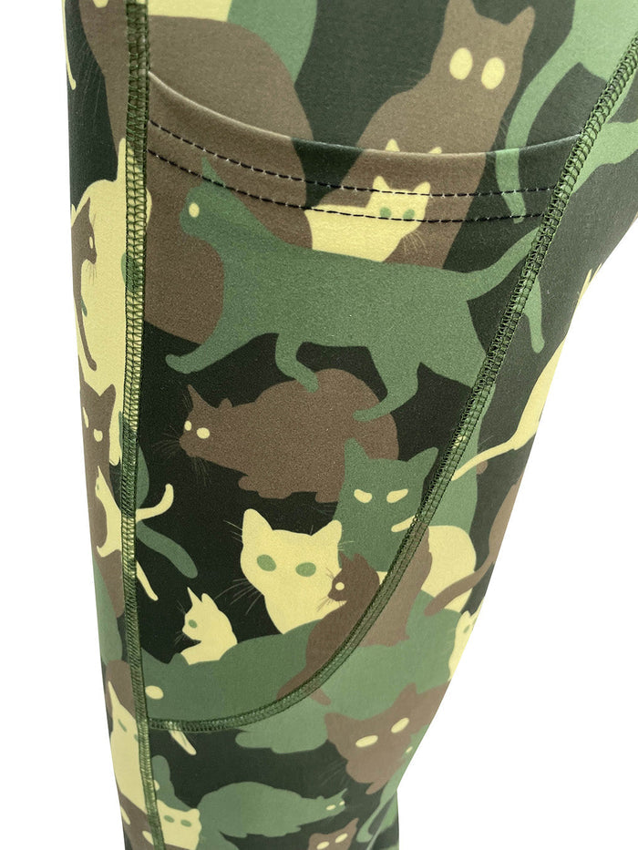 Close-up of Catoflage + Pockets leggings featuring soft fabric with cat camouflage pattern and deep side pocket with extra stitching for structure