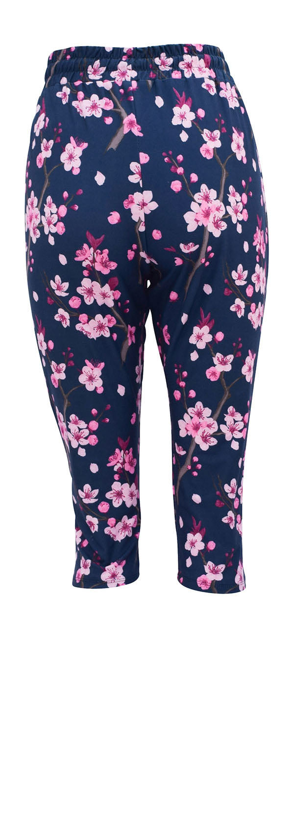 Slim fit cherry blossom joggers with pink flowers on dark blue background, cuffed bottoms, drawstring waist, and pockets.