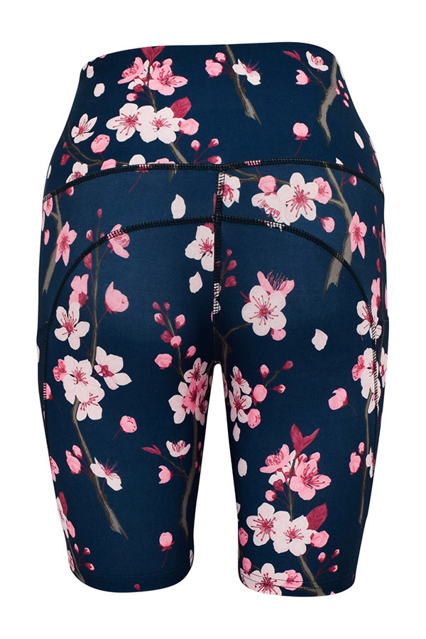 Dark blue cherry blossom shorts with pink floral print and deep side pockets