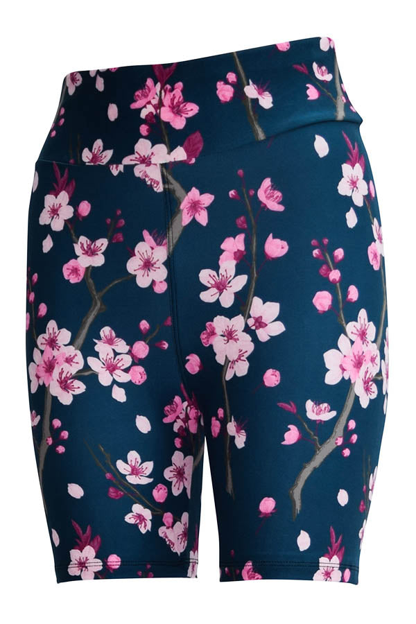 Floral cherry blossom tight shorts in navy with pink and white flowers, stretchy and fitted design.