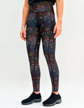 Female wearing Doodles Of Love activewear leggings with multi-colored heart doodle patterns and pockets.