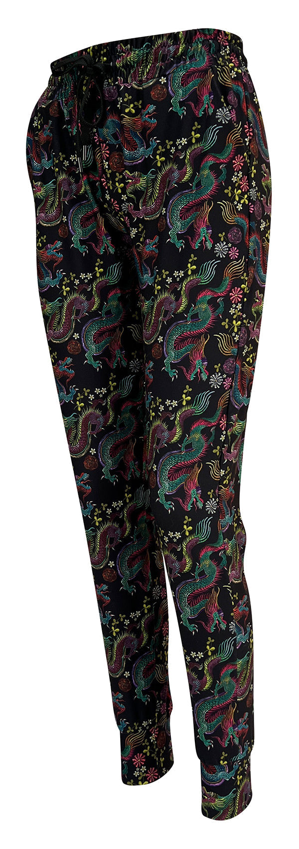 Slim fit black joggers with colorful dragon and floral print, cuffed bottoms, drawstring waist, and pockets.