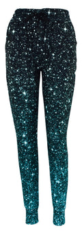 Slim fit emerald cosmos joggers with sparkle effect, drawstring waist, cuffed bottoms, and pockets in soft magic fabric