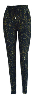 Slim fit Gold Dust Joggers with golden, yellow, and white flecks on black fabric, featuring cuffed bottoms, drawstring waist, and pockets.