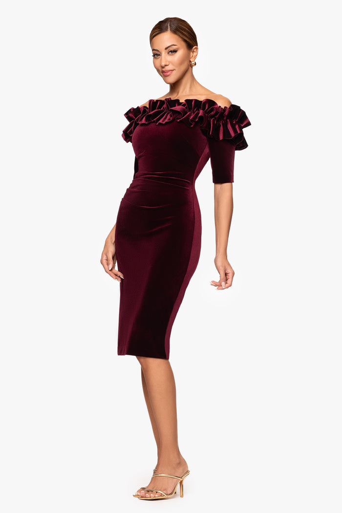 Burgundy “Hayden” Velvet Off the Shoulder 3/4 Sleeve Ruffle Dress, angled three-quarter view