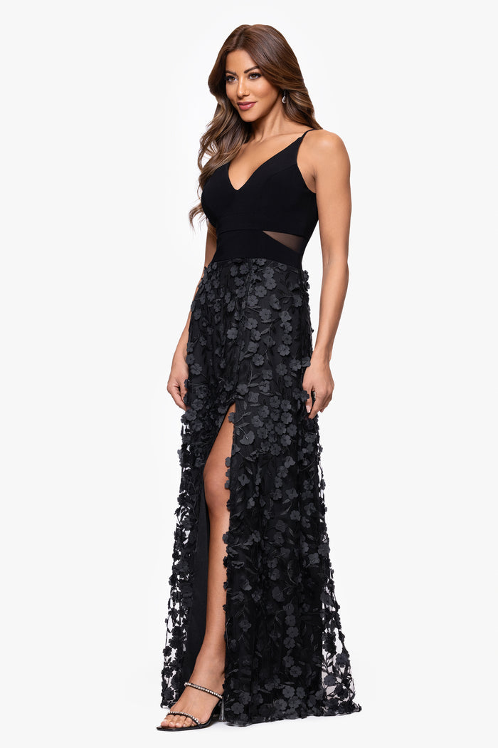 Black “Iris” Jersey Knit V-Neck Raised Flower Dress, angled three-quarter view with skirt slit