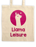 Beige tote bag with pink llama graphic and text "Llama Leisure" printed on front