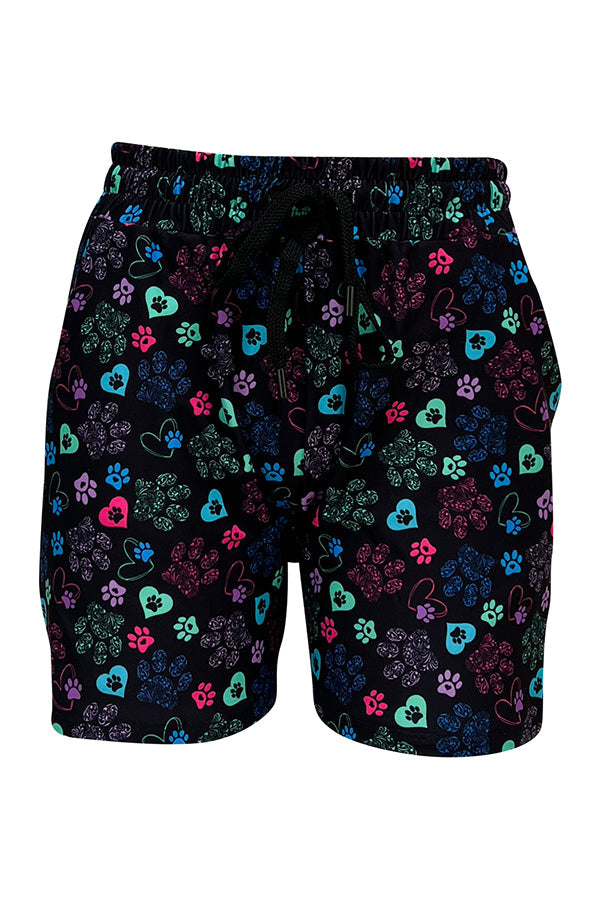 Black jogger shorts with colorful heart and paisley paw print design and elastic waistband.