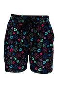 Black jogger shorts with colorful heart and paisley paw print design and elastic waistband.