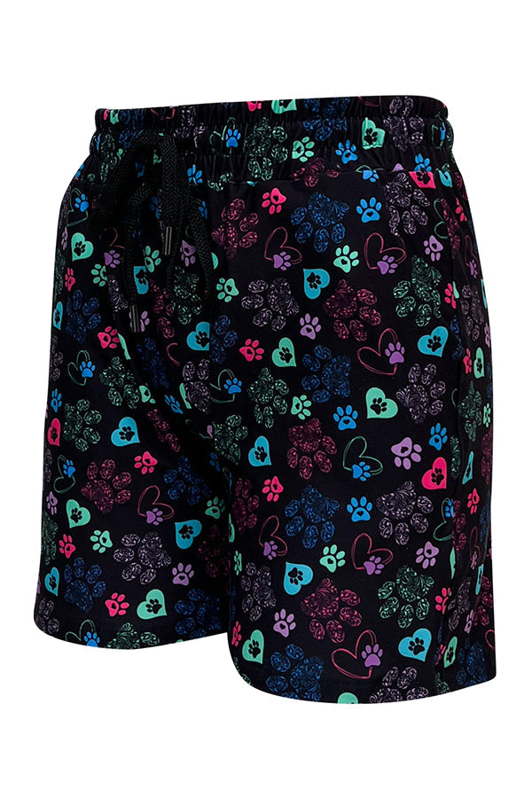 Black jogger shorts with colorful hearts and paisley paw prints, slim fit with elastic waistband and deep pockets.