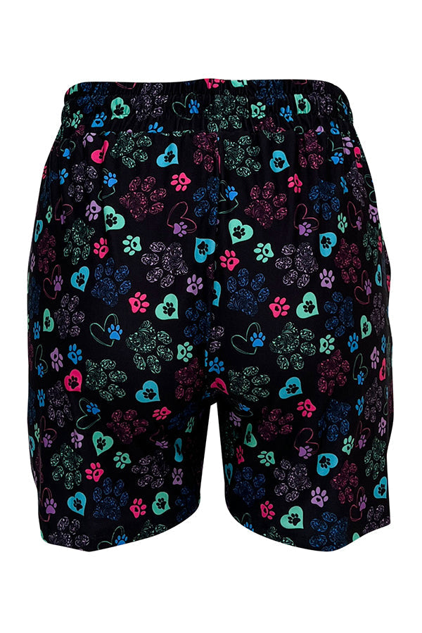 Black jogger shorts with colorful paw prints and heart motifs, slim fit with deep pockets and mid-rise waistband.