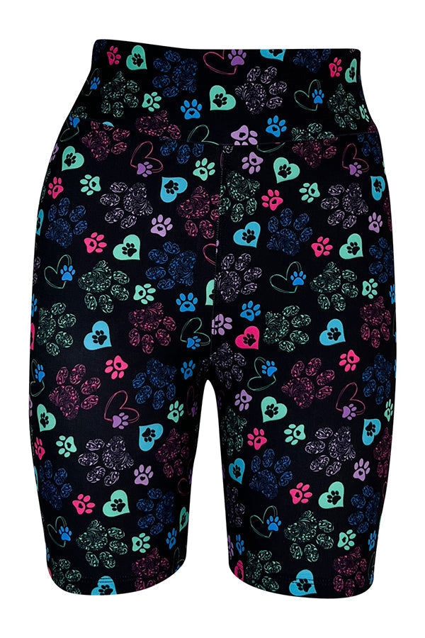 Black tight shorts with colorful heart and paisley paw print pattern, high-quality stretch fabric, comfortable and breathable for activewear.