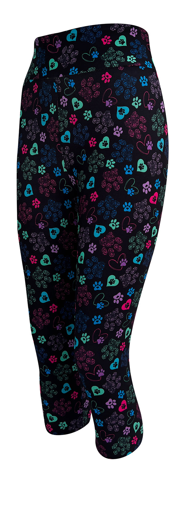 Black leggings with colorful heart and paisley paw prints featuring Magic Paws design