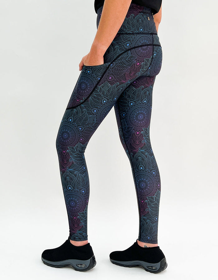 Women's Midnight Mandala gym leggings in charcoal and navy with side pockets and mandala print design