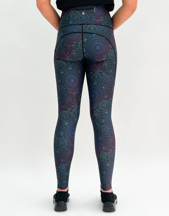 Women's midnight mandala gym leggings with high-rise waistband and side pockets, performance fabric in charcoal and navy tones
