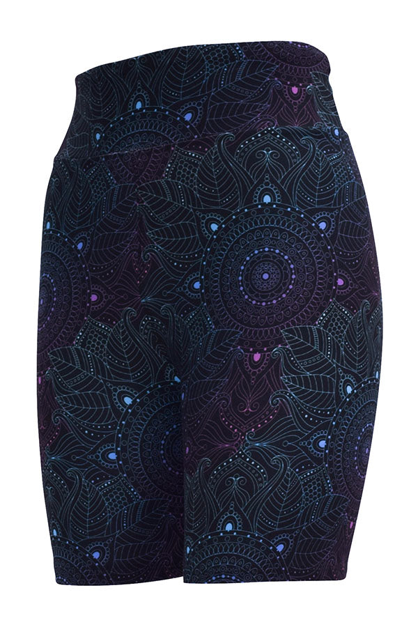 Black tight shorts with intricate midnight mandala pattern in deep blue and purple tones, made from stretchy breathable fabric.