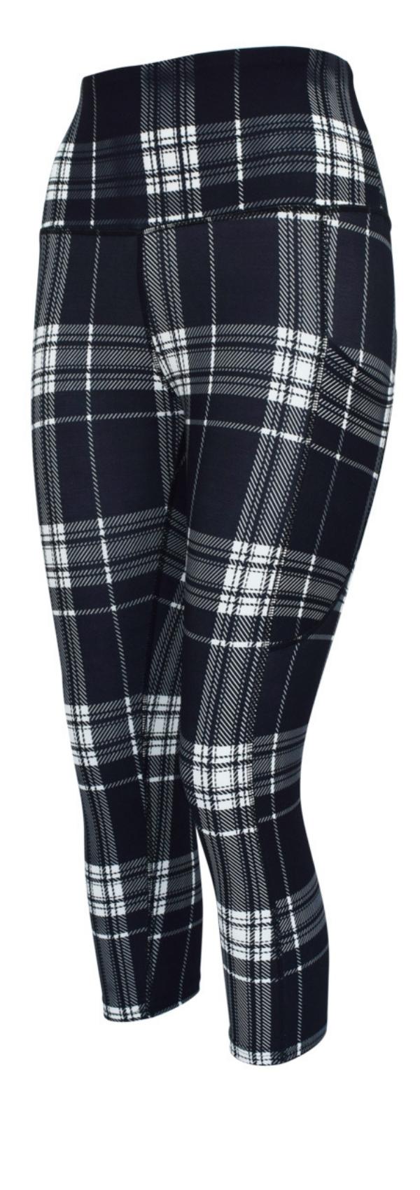 Monochrome tartan leggings with pockets in black and white plaid pattern for versatile comfort and style
