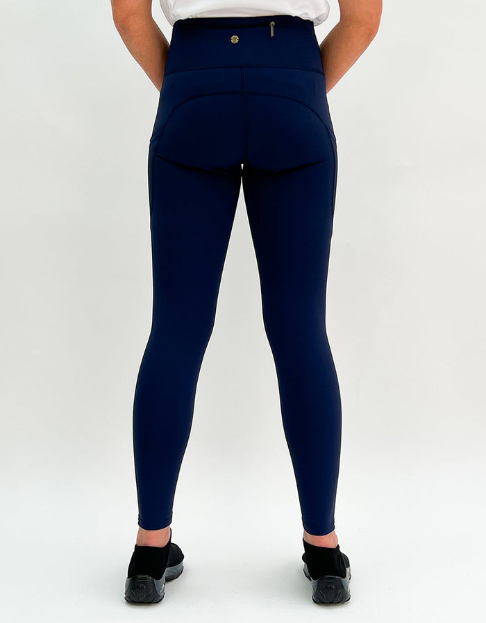 Back view of navy leggings with pockets from Navy Magic Activewear, ideal for workouts.