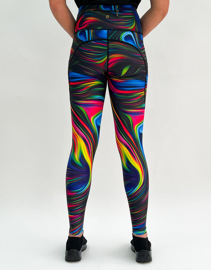 Vibrant neon swirl gym leggings with high waistband and side pockets, made from sweat-wicking, squat-proof fabric for activewear.