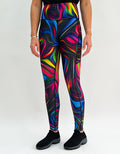 Neon Swirl Activewear leggings with bright, colorful swirl pattern on black background and side pockets