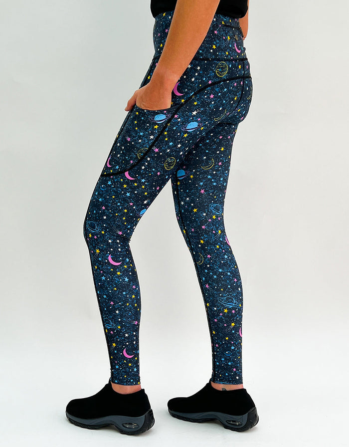 Leggings with out of this world intergalactic star and planet print featuring pockets