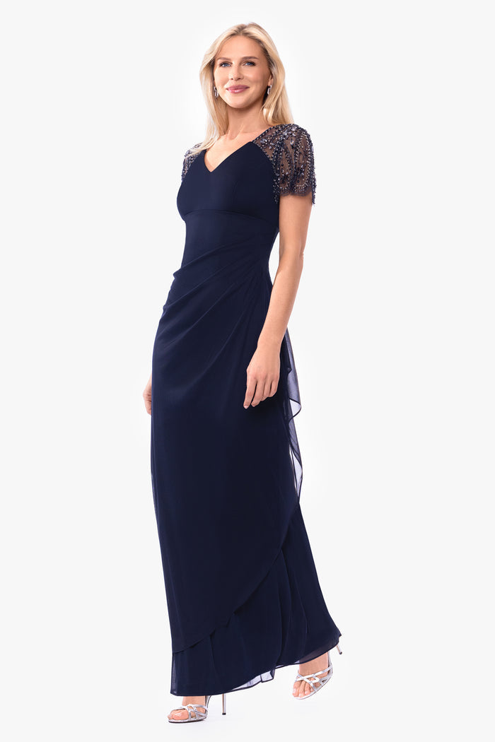 Navy Petite “Lana” Sheer Matte Jersey Beaded Flutter Sleeve Dress, angled three-quarter view with side ruffle