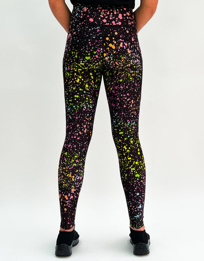 Pink galaxy print gym leggings with high waist and side pockets, designed for comfort and performance.