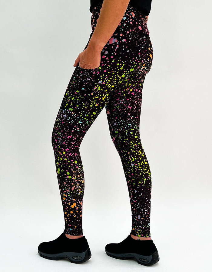 Leggings with pink galaxy activewear design featuring colorful splatter pattern and pockets