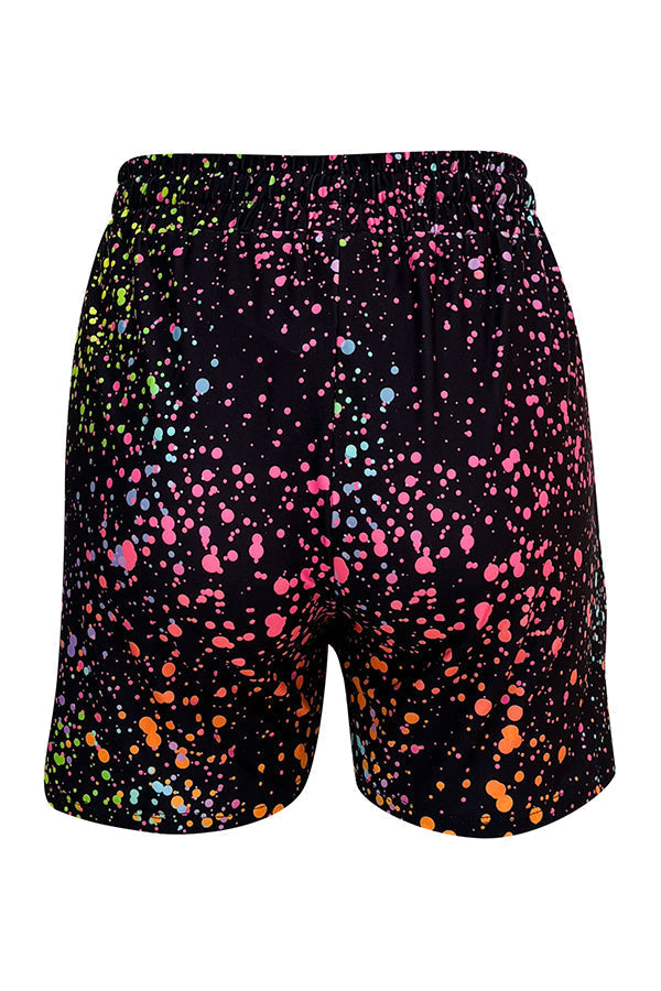 Black jogger shorts with colorful galaxy-inspired splatter print and elastic waistband.
