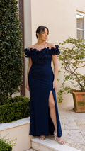 Navy Plus “Anya” Scuba Crepe & Chiffon Ruffle Off the Shoulder Dress, outdoor front view with side slit