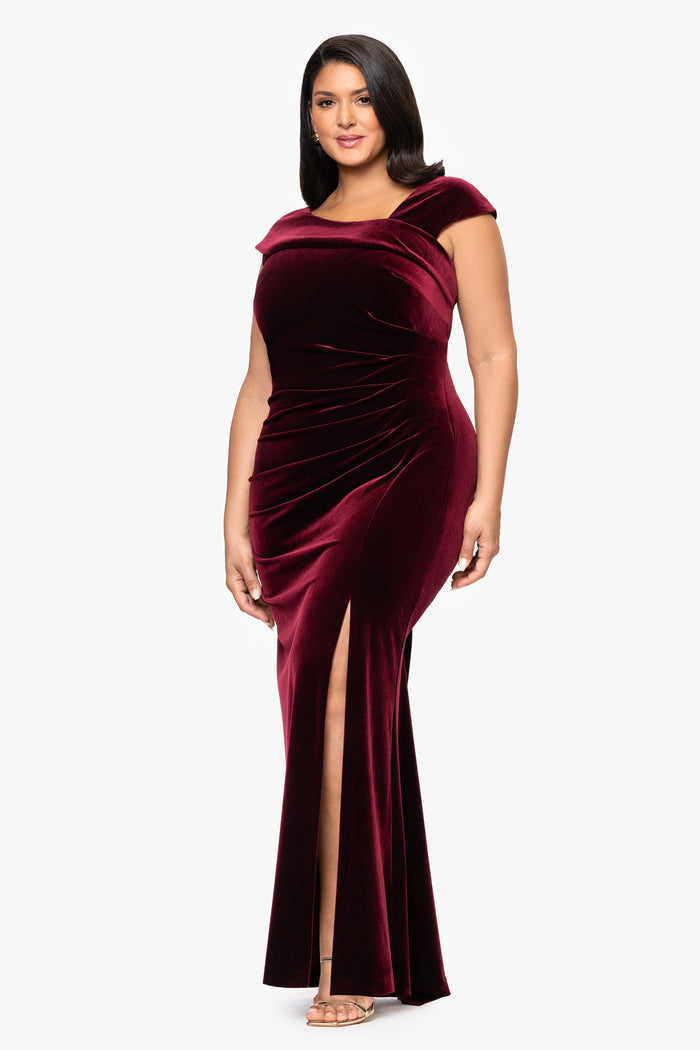 Burgundy Plus “Katrina” Velvet Asymmetrical Neckline Cap Sleeve Dress, angled three-quarter view showing the front leg slit