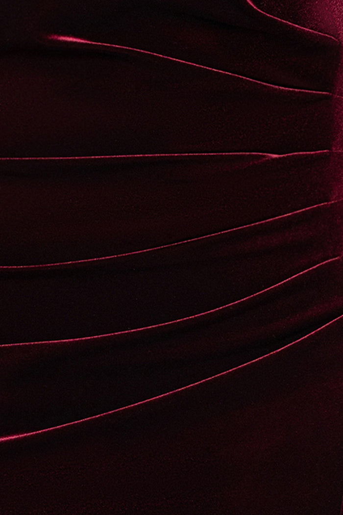 Close-up of the Burgundy velvet texture and ruching on the Plus “Katrina” Velvet Asymmetrical Neckline Cap Sleeve Dress