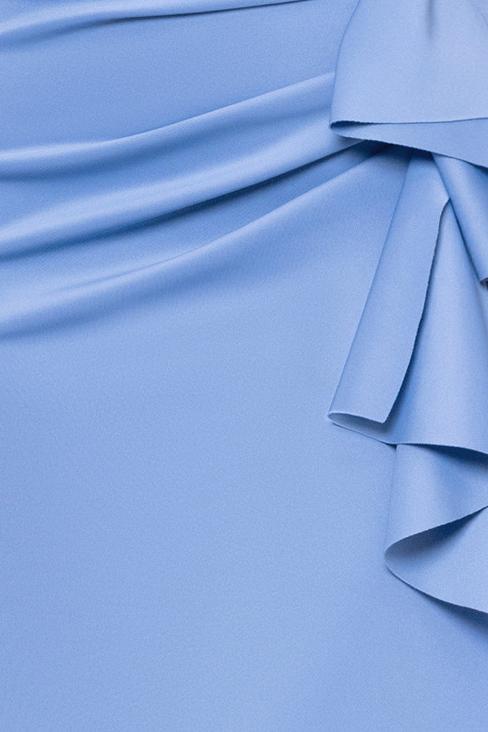 Close-up of the Slate techno scuba fabric, ruching, and ruffle on the Plus “Patti” Techno Scuba Off The Shoulder Dress