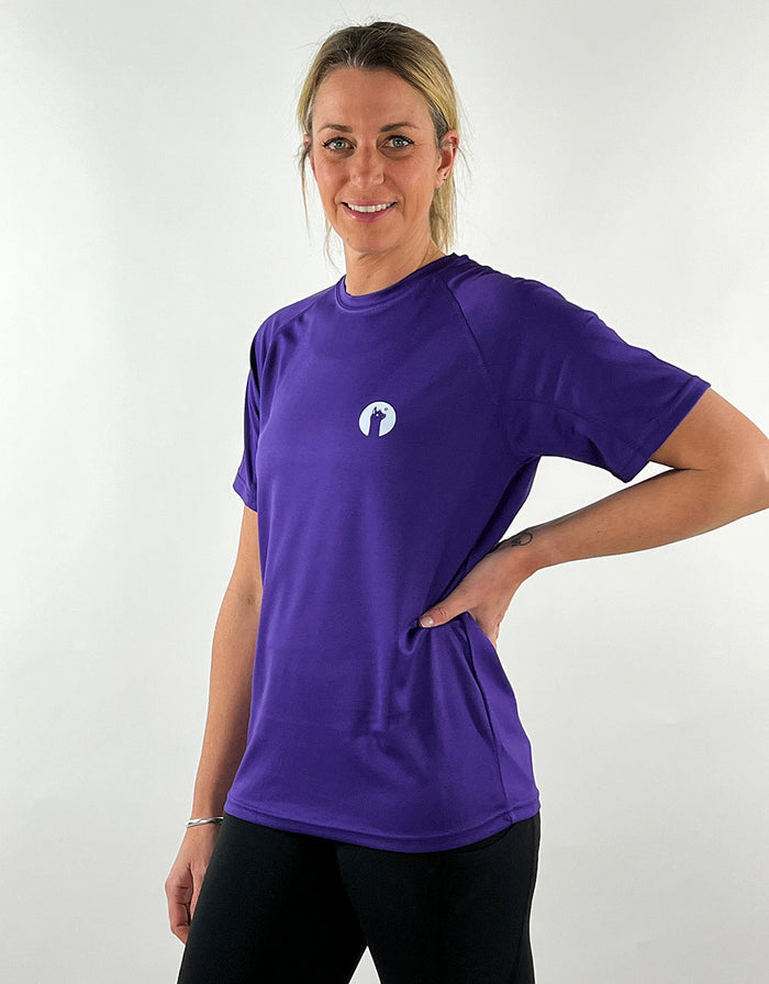 Woman wearing a purple active llama lightweight breathable t-shirt for workouts