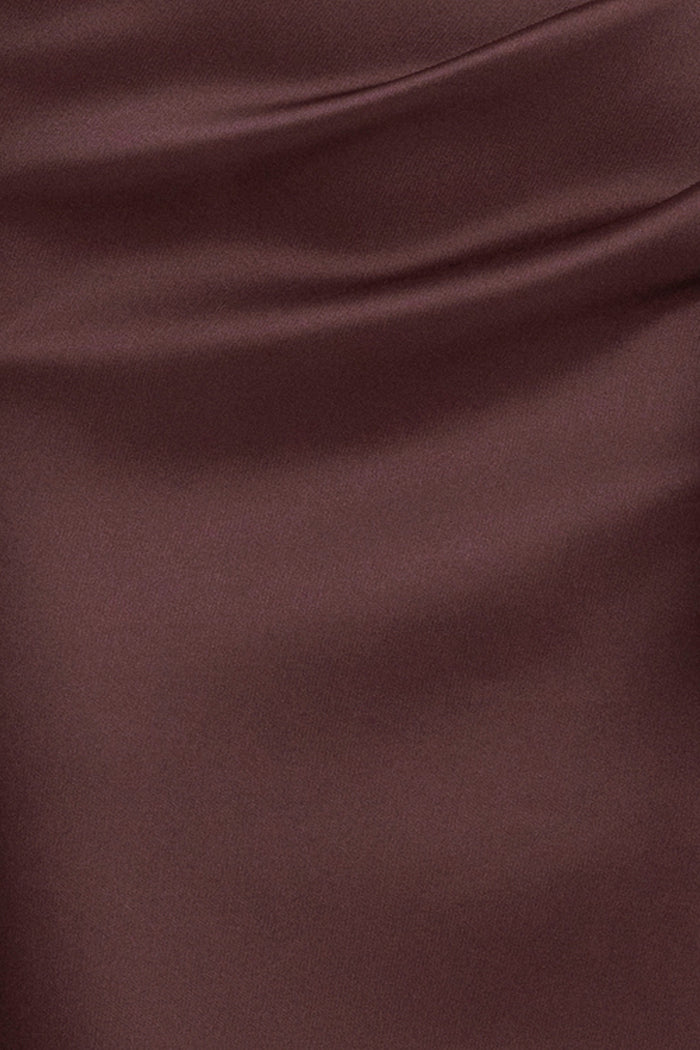 Close-up of the chocolate satin fabric and side ruffle detail on the "Remi" Satin Strapless Side Ruffle Floor Length Dress