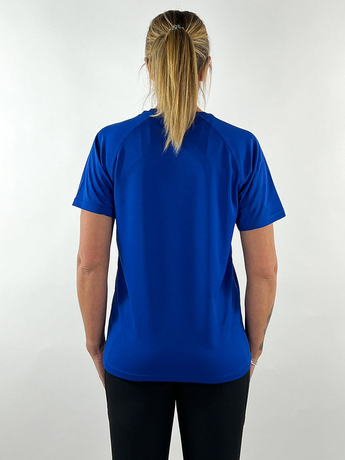 Back view of a woman wearing a royal blue active llama t-shirt, breathable and quick-drying fabric.