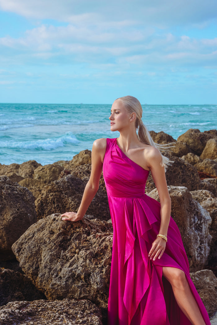 Magenta “Samantha” Organza One Shoulder Ruffle Dress, editorial seated view with side slit