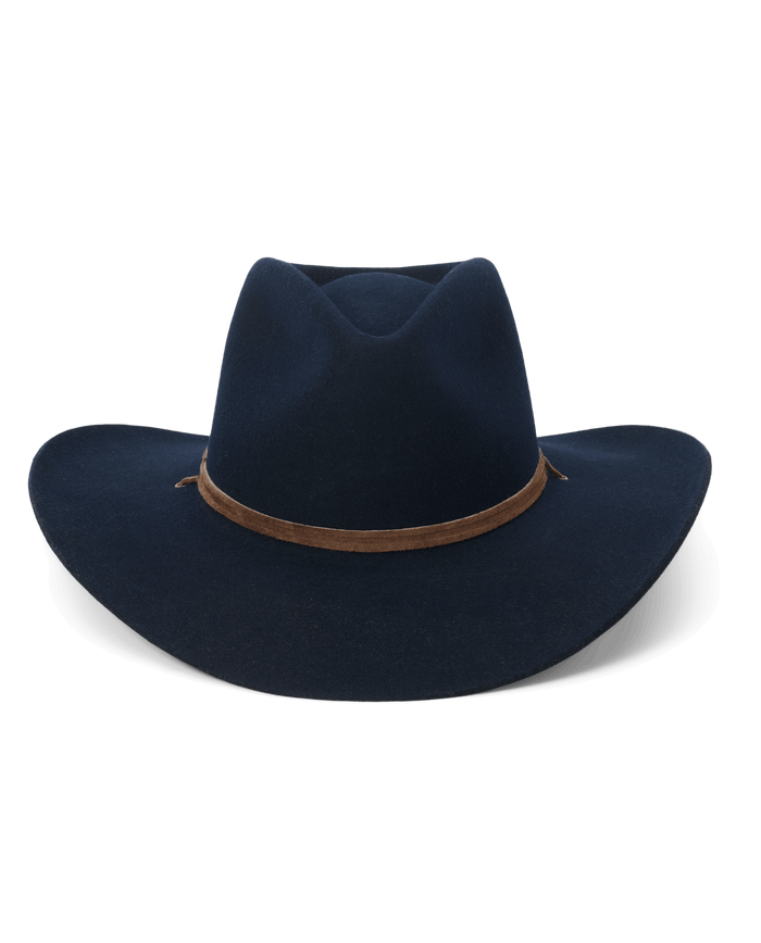 A navy “The Ridge Hat” by THE GREAT. F26 STETSON, featuring a wide brim and a brown band around the crown, displayed on a white background.