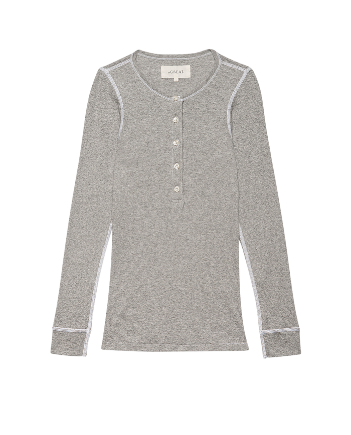 The Baby Rib Henley in Heather Grey by THE GREAT. F25 BABY RIB is a vintage-inspired slim henley with long sleeves, white buttons, and white stitching, crafted from recycled cotton and shown laid flat on a plain background.