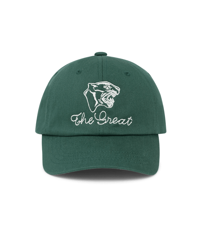 The GREAT. Baseball Hat in green cotton features vintage panther head embroidery above "The Great" on the front.