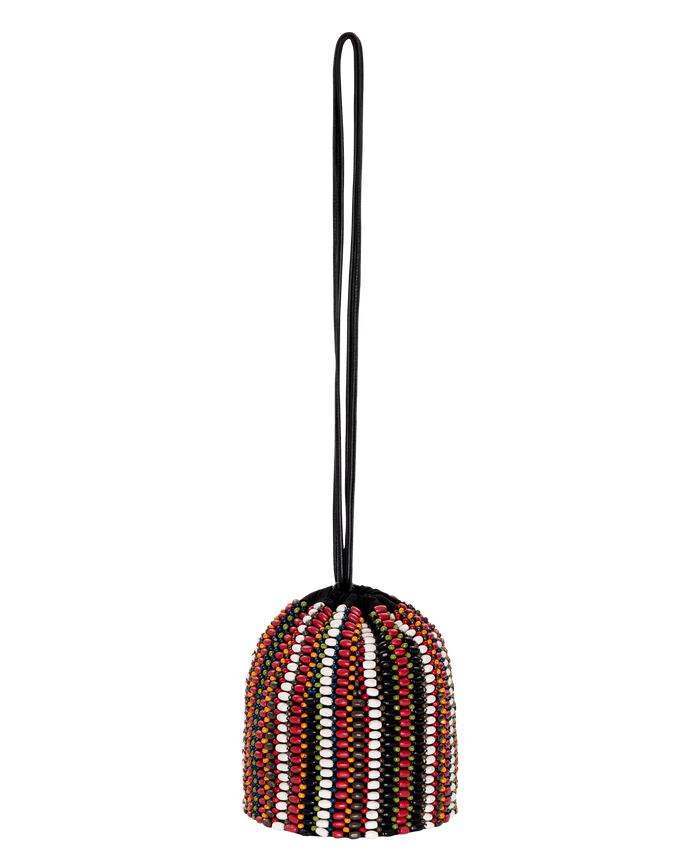 The Beaded Cinched Bucket Bag – Cabana Stripe by THE GREAT. SU26 features multicolored vertical beads and a long black strap, shown against a white background.