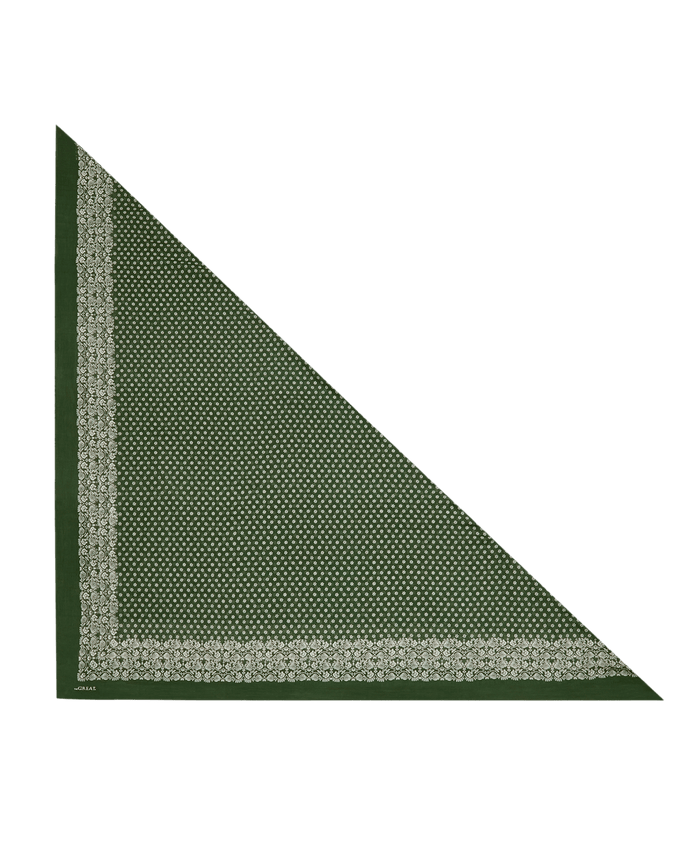 THE GREAT. F26 BIG BANDANA — "The Big Bandana. -- Army"—in a large army green cotton, features a small white floral pattern and a decorative border around the edges, shown laid flat on a white background.