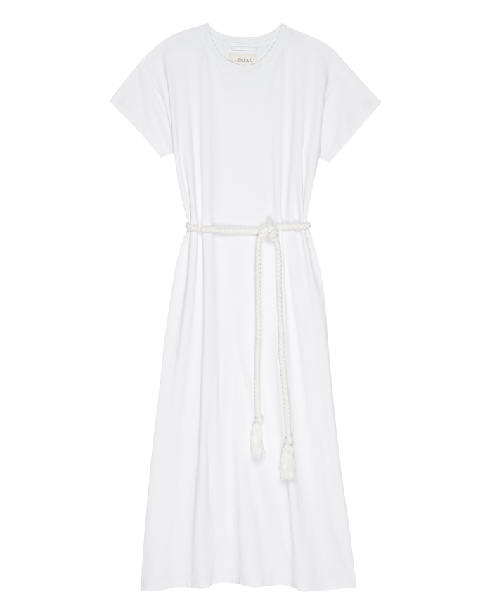 The Boxy Tee Dress in True White by THE GREAT. is a heavyweight jersey midi dress with short sleeves, a round neckline, and a cotton rope belt at the waist.