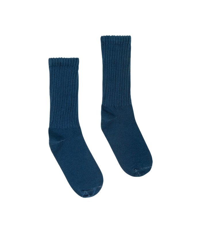 A pair of The Classic Crew Sock in navy by THE GREAT. H25 BRIGHT FLEECEBACK, shown side by side on a plain white background.