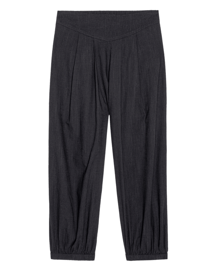 The Elastic Blouson Pant in black by THE GREAT. SU26 features a loose fit, slight waist pleat, and elastic ankle cuffs, shown laid flat on a white background.