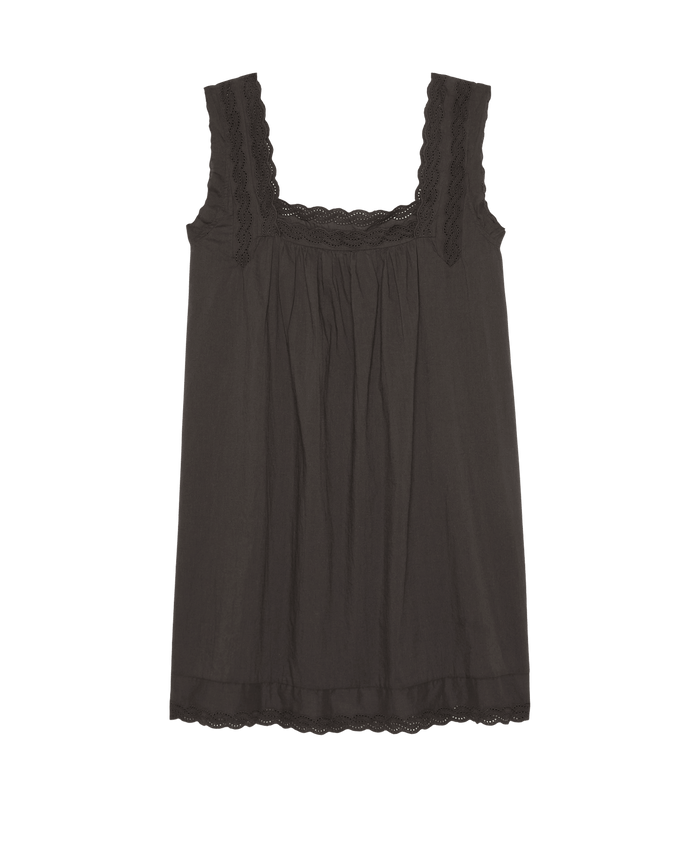 The Eyelet Mini Tank Dress by The Great. SP26 Sleep features a sleeveless black silhouette with a square neckline, lace-trimmed straps and hem, and gathered fabric at the chest.